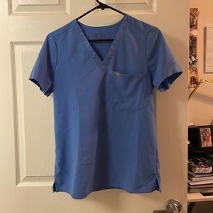 Figs scrub top in a size small in color ceil blue! Gently used!